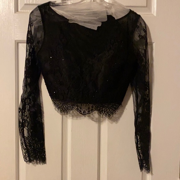 Black and white hoco dress. Worn twice. Bottom is a little dirty not noticeable. - Picture 1 of 4